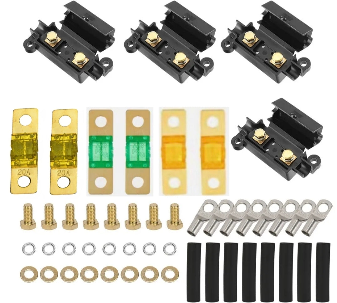 Collection of 20 30 40a midi fuse and cable lugs on a white background