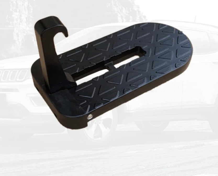 Black door step with a textured surface on a white background