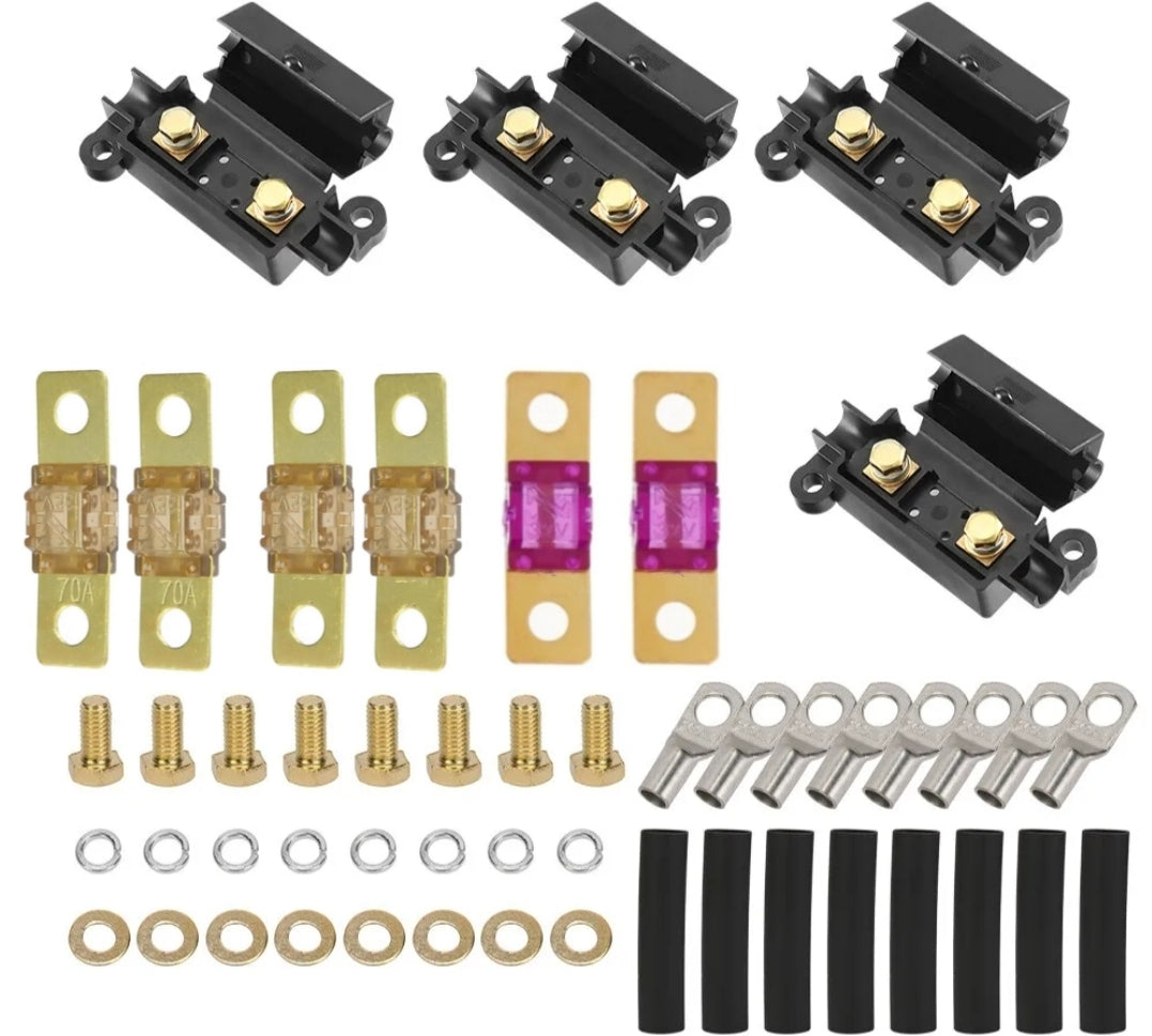 Collection of 70 120 150a midi fuse kit and cable lugs on a white background