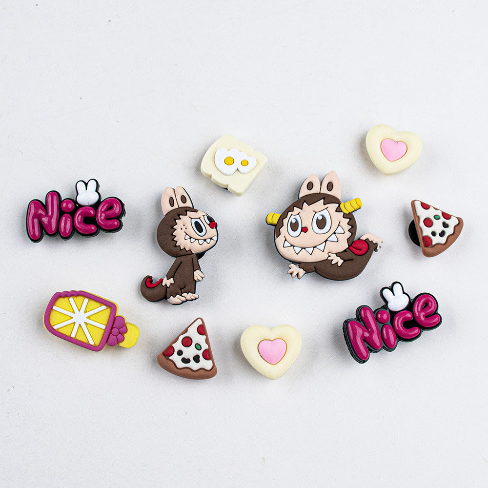 Collection of cartoon character labubu and food-themed pins shoe charms on a white background