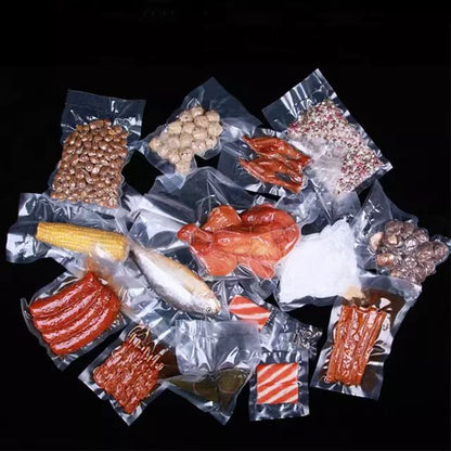 Collection of vacuum-sealed bag packages on a black background