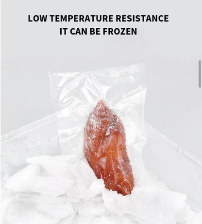 Frozen salmon in a vacuum sealer bag with text about low temperature resistance.