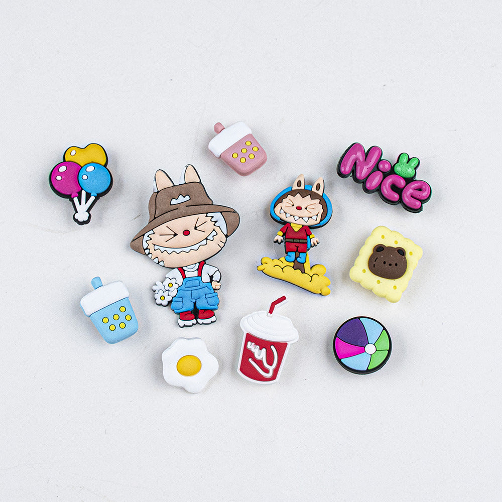 Set of colorful character-themed labubu shoe charms on a light gray background
