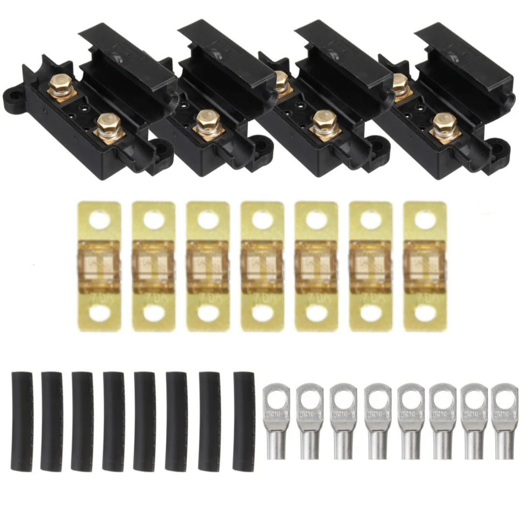 Set of midi fuse kit electrical components including fuse blocks and terminals on a white background