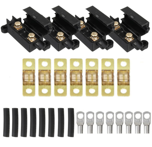 Set of midi fuse kit electrical components including fuse blocks and terminals on a white background