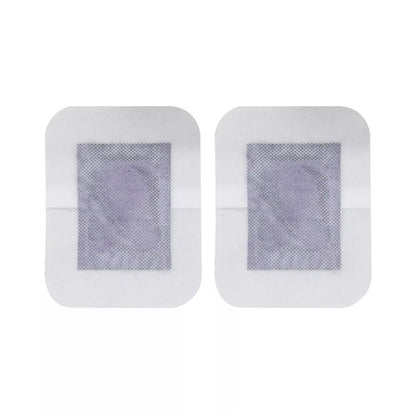 Two detox foot patches on a white background