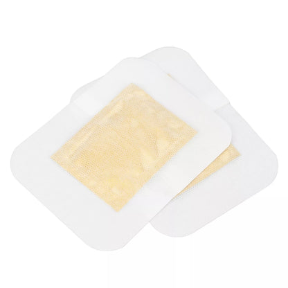 Two detox foot patches on a white background