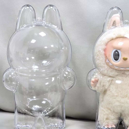 labubu Clear rabbit-shaped container with a fluffy white toy inside, on a neutral background