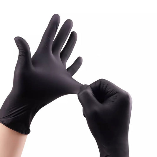 nitrile gloves being worn on a white background